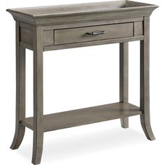 a gray wooden table with drawers and shelves on it's sides, in front of a white background