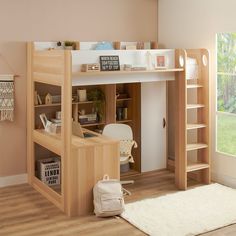 a loft bed with a desk underneath it and shelves on the bottom level, in front of a window