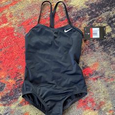 Classic Black Nike Swimsuit Girls Size Xs Recommended For Ages 6-8 New With Tags And Hygiene Safety Strip Nike Fitted Casual Swimwear, Nike Swimsuit, Nike Swim, Kids Swimming, Black Nike, Kids Nike, Nike Black, Black Nikes, Classic Black