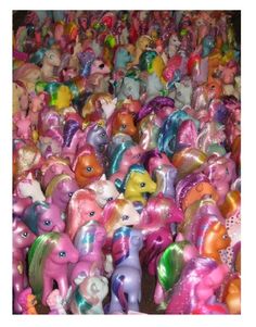 a large amount of little pony toys all in different colors