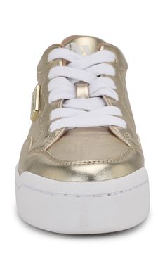 A glitter-embellished collar and metallic finish charms this low-top sneaker elevated by a chunky platform sole. Synthetic upper/textile lining/synthetic sole Imported Calpak Luggage, Embellished Collar, Flip Flop Slippers, Ugg Classic, Designer Crossbody Bags, Chunky Platform, Sweaters And Leggings, Fine Jewellery Earrings