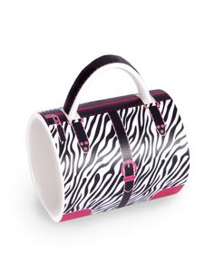 a zebra print handbag with pink trimmings on the handles and handle is shown