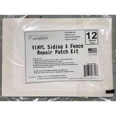 vinyl siding and fence repair patch kit in clear plastic bag on top of a table