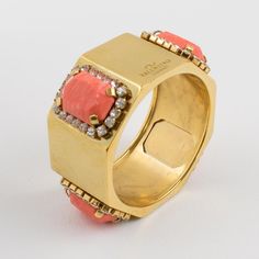 This is part of Chairish’s Costume Jewelry assortment.  This stunning Valentino Garavani Haute Couture bracelet features a chunky faceted heavy gilded metal bangle shape ornate with tiny crystal rhinestones and large faux-coral resin cabochons (four designs all around). Valentino's hallmark is engraved on the side. Good condition, with minor wear on the metal, but nothing obvious. Measurements: 2.57 in diameter (6.5 cm) x 1.50 in high (3.8 cm). The inner circumference of the bracelet is 8.04 in Metal Bracelet, Modern Branding, Bracelet Bangle, Metal Bracelets, Valentino Garavani, Crystal Rhinestone, Costume Jewelry, Hallmark, Bangle Bracelets