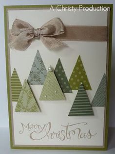 a christmas card with some trees on it