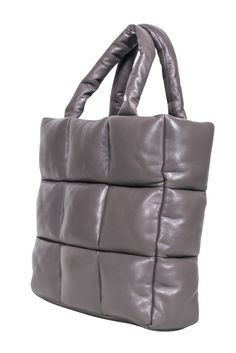 The "Assante" Puffy Tote from Stand Studio is the perfect way to add a touch of fun to your wardrobe. This trendy tote features gorgeous quilted leather in a subtle taupe hue, making it the perfect neutral to match any outfit. Show off your style with this must-have puffy bag! 100% Lamb Leather Lining 100% Polyester No top closure Dust bag included Double top handle Detachable crossbody strap Internal zipper pocket Width 15" Height 13" Depth 6" Strap drop 7" Modern Quilted Bag For Shopping, Modern Quilted Shopping Bag, Trendy Quilted Leather Bag, Brown Quilted Leather Bag, Trendy Quilted Leather Shoulder Bag, Quilted Leather Square Bag, Quilted Square Leather Bag, Square Quilted Leather Bag, Trendy Quilted Bags For Fall