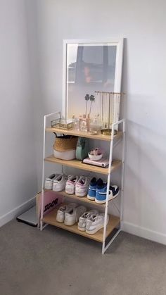 there is a shelf with shoes on it