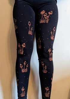 "Hand drawn, made to order bleach art leggings by me, Jess! PATTERN APPEARS ON BOTH SIDES. The pattern will never fade.  Hand-drawn designs on ethical, organic black cotton leggings. The leggings are high quality and not see-through. IMPORTANT INFO: Exchanges welcome if sizing is incorrect (Customer pays return postage). Due to the nature of bleach, the colour of the pattern may vary in shade of orange/red. \"Change of Mind\" returns are not accepted. All items are made to order. Please be aware Fitted Black Bottoms For Christmas, Christmas Cotton Pants, Liberty Caps, Bleached Leggings, Extra Long Leggings, Bleach Art, Art Clothing, Long Leggings, Cotton Leggings