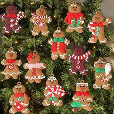 a christmas tree decorated with gingerbread cutouts