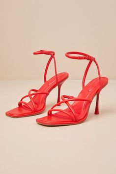 The fiercest of 'fits aren't complete without the D'Amelio Footwear Dalilah Coral Red Ankle Strap High Heel Sandals! Smooth faux leather shapes these standout heels with a square footbed, a strappy crisscrossing vamp, and an open-toe design. Slender straps sprout from the sides that wrap and secure around the ankle with a matching coral red buckle. A sexy stiletto heel finishes the look! 4" stiletto heel. Cushioned insole. Rubber sole has nonskid markings. Man made materials. Imported. Lulus | D Red Heels With Sculpted Heel And Single Toe Strap, Red Sandals With Padded Heel And Ankle Strap, Red Ankle Strap Sandals With Padded Heel, Red Ankle Strap Sandals, Bold Sandals With Heel And Ankle Strap, Chic Red Strap Sandals, Red Heels With Wrapped Heel And Single Toe Strap, Fitted Red Sandals With Heel Strap, Bold Red Sandals For Summer