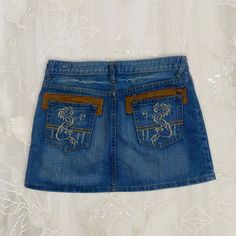 Rare Y2K Vintage Denim Mini Skirt rare mini skirt by the brand REPLAY, cool dragon embroidery on back pockets, love!! Brand: Replay Size: XXL, fits L-XL best! Waist: 32" Length: 15" ♡ALL ORDERS INCLUDE TRACKED SHIPPING♡ Mini Rock, Dragon Embroidery, Replay Jeans, Jean Vintage, Navy Skirt, Denim Mini, Denim Mini Skirt, Skirt Leather, Vintage Jeans