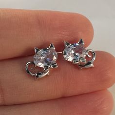 Beautifully Crafted Classic Design Zircon Cat Stud Earrings 18k White Gold Filled With Large Oval Sparkling Simulated Diamond Topaz Zircon Gemstones. Top Quality, High Polished Shine, Brand New, Never Been Worn. Lead, Nickel Free. These Earrings Sparkle. Perfect Jewelry For Any Day, Special Occasion Gift Anniversary Banquet Dating Birthday Promise Prom Dance Holiday Party Christmas Stocking For Yourself Mom Women Daughter Sister Granddaughter Teen Or Friend. Free $18 Gift Of Your Choice In My Li Cat Stud Earrings, Earrings Sparkle, Cat Earrings Studs, Prom Dance, Sparkle Earrings, Christmas Stocking, Party Gifts, Holiday Party, Classic Design