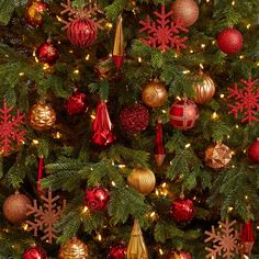 a christmas tree with red and gold ornaments