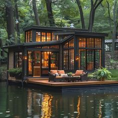 a house boat floating on top of a body of water