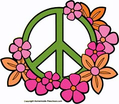 a peace sign with flowers around it