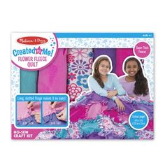 the crochet do - it - me flower fleece quilt kit is shown