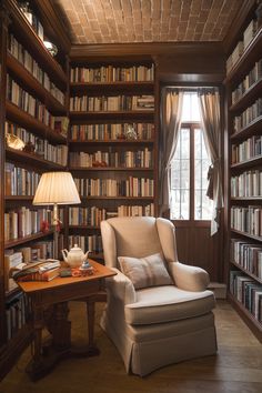 a living room filled with lots of book shelves and a chair in front of a window