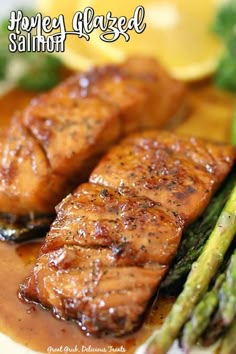 grilled salmon and asparagus on a white plate