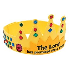 a yellow crown with the words the lord has transformed me a crown on it's side