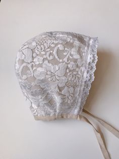 Handmade bonnet with beige and white patterns & lace. 100 % cotton fabric. Very comfy for your baby to wear. Cute and  protective as well. Protective from wind.  *Comes in sizes 0-3 months and older, all the way up to 3 years old:) Fitted White Bonnet With Lace Trim, Fitted White Bonnet For Baptism, White Fitted Bonnet For Baptism, White Fitted Hat With Lace Trim, Adjustable Cotton Bonnet With Lace Trim, White Adjustable Lace Bonnet, Fitted Vintage Bonnet With Lace Trim, White Lace Adjustable Bonnet, Adjustable Cream Bonnet For Baptism