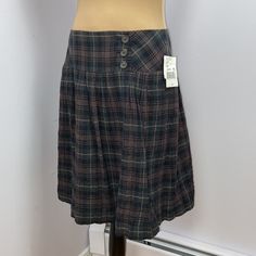 Tres Chic! Nwt Cabi Show Stopper A-Line Plaid Skirt. Front Buttons Accent With Extra Button, Hidden Zipper. Colors Are A Muted Green, Black, Mauve And Cream Plaid. Dark Academia Vibe. The Cotton Fabric Makes It Versatile, Great To Wear Year Round! Aline Skirt, Plaid Skirts, Tres Chic, A Line Skirts, Womens Skirt, Cotton Fabric, Plaid, Cream, Green