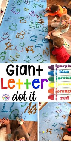 two children are playing with letters and numbers on a blue mat that says giant letter do it