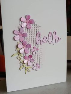 a white card with pink flowers and the word gerl on it's side