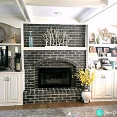 a living room filled with furniture and a fire place