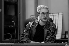 a man sitting in front of a computer keyboard