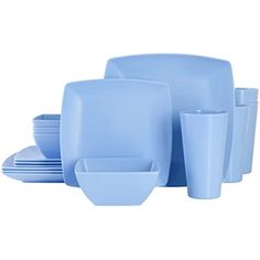 blue dishes and cups are stacked on top of each other, with one bowl in the middle