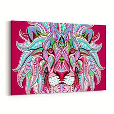 a colorful lion's face on a pink background canvas wall art print by artist unknown