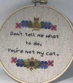 a cross stitch pattern with the words don't tell me what to do, you're not my cat