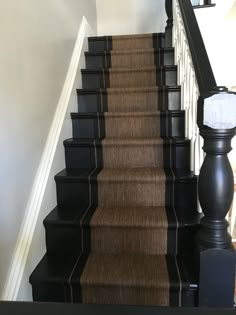 the stairs are painted black and brown