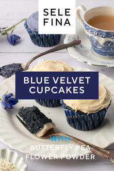 blue velvet cupcakes with buttery pea flower powder on a white plate next to a cup of tea