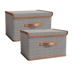 two grey and brown baskets with leather handles