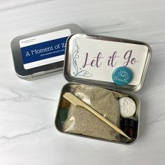 A fun and aromatic twist to the traditional zen garden. This little zen garden kit makes a great addition to any desk and gives you a moment of zen during the busy work/school day. Promotes a mindfulness time out when you need to clear your mind so you can get back to work. The tin helps to keep everything contained and clean as well. The affirmation card inside the zen garden kit is double sided with two different affirmation and the small Breathe magnet helps keep the card in place. The essent Mini Zen Garden, Zen Gardens, Recycle Cans, Garden Kit, The Zen, Get Back To Work, Fun Games For Kids, Meditation Crystals, Clear Your Mind