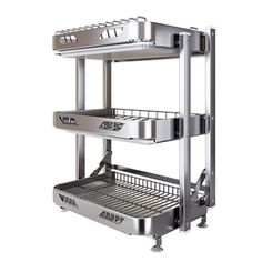 a stainless steel shelf with two trays on each side and an open drawer underneath it