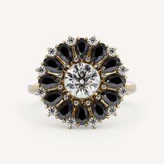 Winona features a round center stone with a bold halo made of black spinel and diamond stones in a basket setting on a half round shank. Jewelry Education, Basket Setting, Trending Engagement Rings, Ring Trends, Engagement Rings Bridal Sets, Metal Shop, Ring Ideas, Antique Engagement Rings, Black Spinel