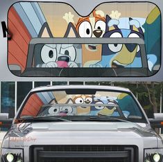 the front view mirror of a car with cartoon characters on it