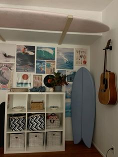 there is a surfboard and other items in the room