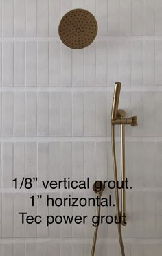 a shower head with the words vertical grout 1 horizontal tec power grout