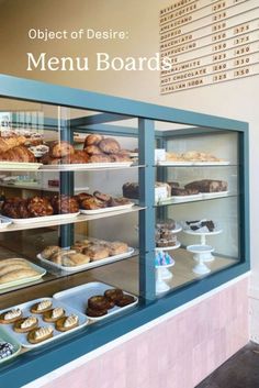 a bakery display case filled with lots of pastries