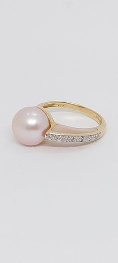 PINK and Mother of Pearl 14K Yellow Gold diamonds Ring. Diamond Pearl Engagement Ring. Vintage Pearl Engagement Ring.14K Yellow Gold Pink Pearl. 8mm Pearl Ring with Pink Mother of Pearl and Diamonds. Product Info: - Stone: Pink Freshwater Pearl/Pink Mother of Pearl/Diamonds. - Pearl Color: Pink. - Pearls size: 8mm round. - Sparkling diamonds. - Metal: 14K Yellow Gold. - Ring Size 7 - Made in USA. - Nice Gift Box Included Pink Pearl Ring, Pearl Engagement Ring, Pink Pearls, Yellow Gold Diamond Ring, Aquamarine Pendant, Pearl Pink, Diamonds Ring, Vintage Pearl, Vintage Pearls