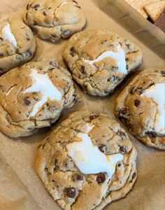 chocolate chip cookies with marshmallows and white icing