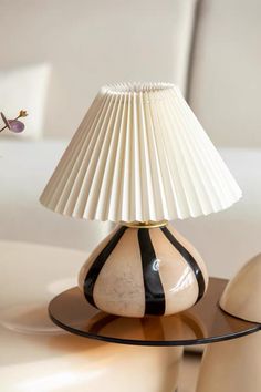 a lamp that is sitting on top of a table