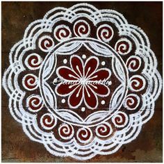 a white doily with red flowers on it