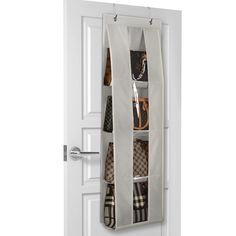 an over the door hanging organizer holds purses and handbags, while it is open to show what's inside