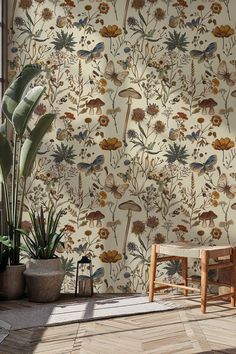 the wallpaper in this room is decorated with flowers and plants, along with a wooden bench