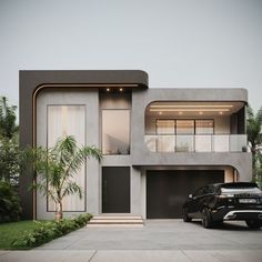 a black car parked in front of a modern house