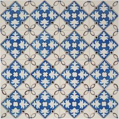 a blue and white tile with an intricate design